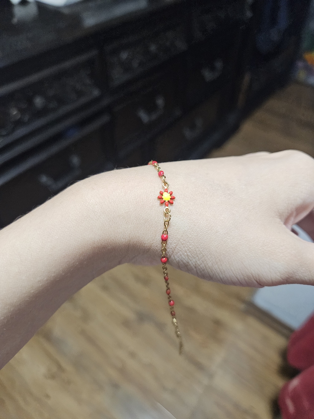 Bracelet orange with Flower Charm